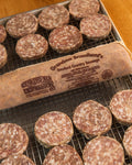 Grandma Broadbent's hickory smoked country sausage in a 1 lb cloth sack